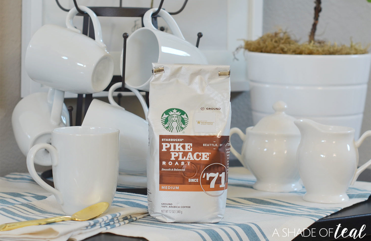 Bag of Starbucks brand ground coffee with coffee cups